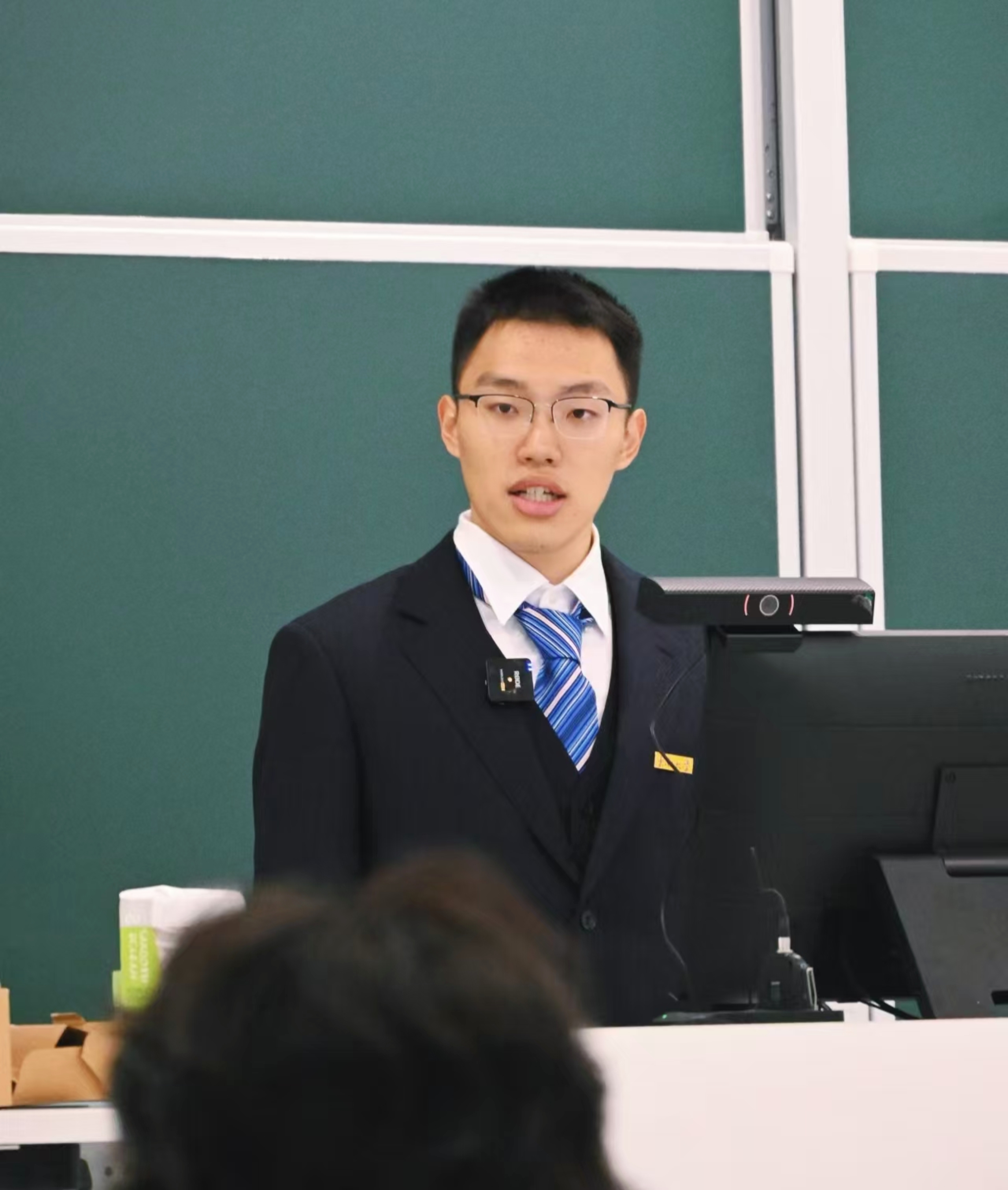 Zhiyuan Yu presenting in a classroom
